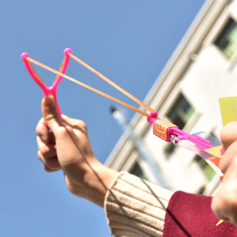 LED Light Toys 50/100pcs Amazing Light Toy Arrow Rocket Helicopter Flying Toy Party Fun Gift Rubber Band Catapult