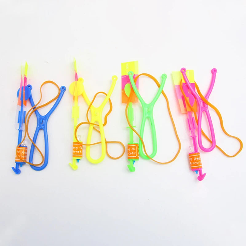 LED Light Toys 50/100pcs Amazing Light Toy Arrow Rocket Helicopter Flying Toy Party Fun Gift Rubber Band Catapult