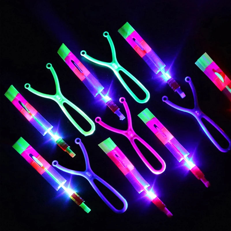 LED Light Toys 50/100pcs Amazing Light Toy Arrow Rocket Helicopter Flying Toy Party Fun Gift Rubber Band Catapult