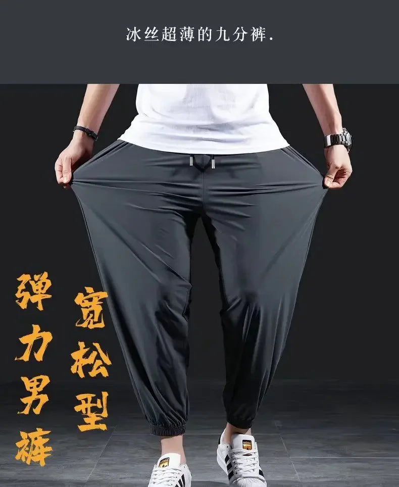 Summer Quick-drying Ice Silk Casual Pants Men's Ultra-thin Elastic Nine-point Pants Loose Drape Solid  Beam Feet Pants 7XL
