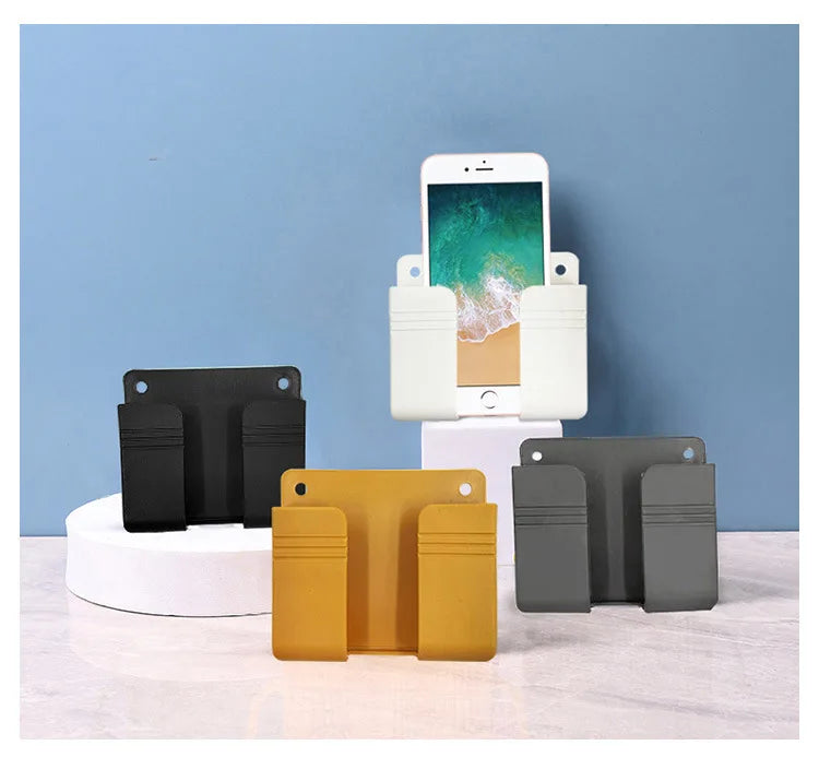 Wall Mounted Phone Holder for IPhone Punch Free Wall Mobile Phone Charging Stand Lazy Sticky Remote Control Storage Box Bracket